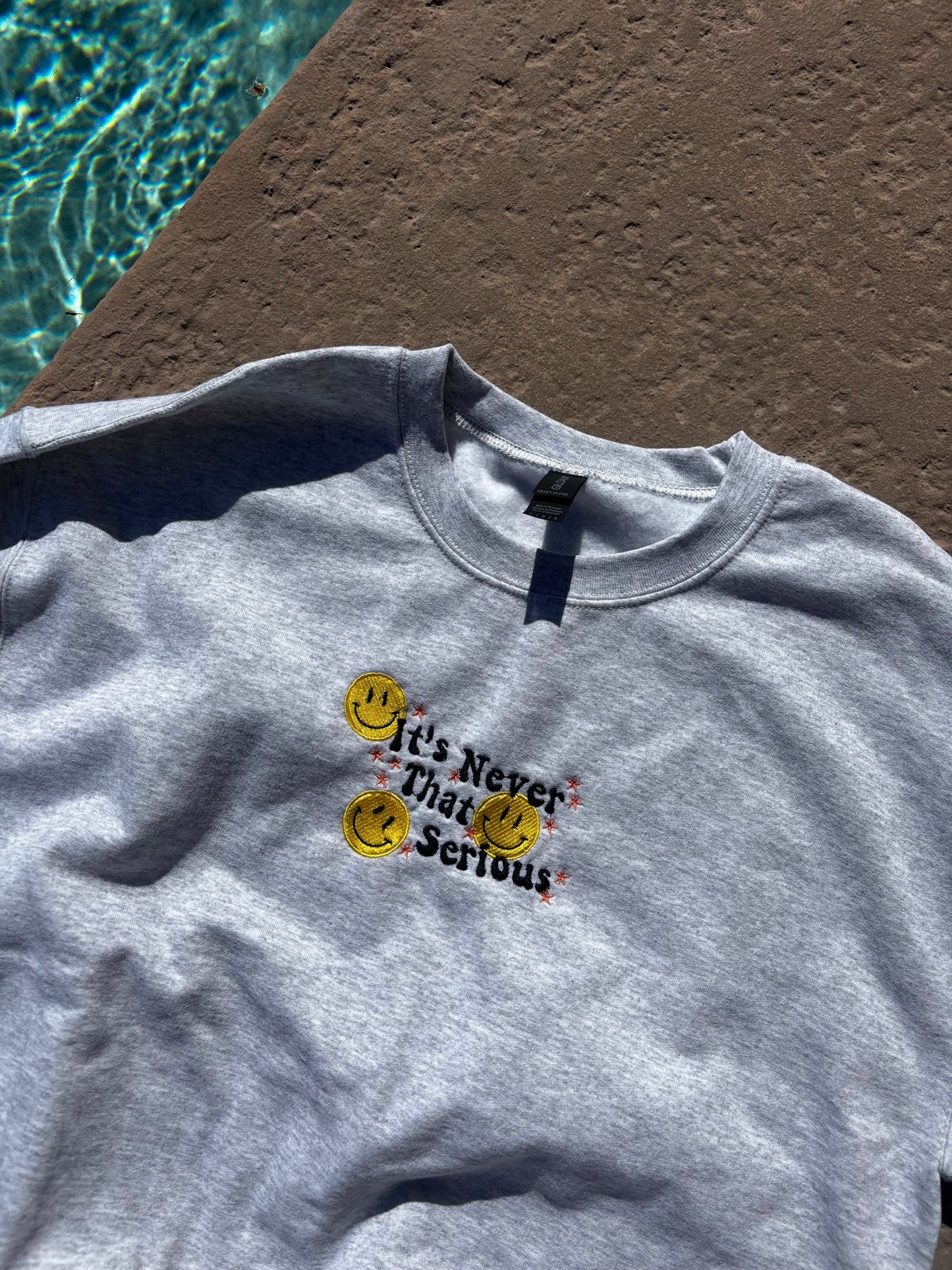 It's Never that Serious Crewneck ☺︎
